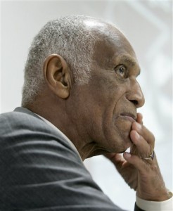 In this Aug. 1, 2007 file photo, Milton Crenchaw, who was a member of the first all-black unit in the Army Air Corps during World War II known as the Tuskegee Airmen, prepares to speak in a lecture series at the Butler Center for Arkansas Studies in Little Rock, Ark. Chrenchaw died Tuesday, Nov. 17, 2015, in Georgia. He was 96. (AP Photo/Danny Johnston, File)