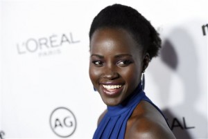 In this Jan. 12, 2016 file photo, actress Lupita Nyong'o poses at the Marie Claire Image Maker Awards in Los Angeles. Following a second straight year of all-white acting Oscar nominees, Nyongo said Tuesday, Jan. 19, on Instagram she was joining in calling for change in expanding the stories that are told and recognition of the people who tell them. (Photo by Chris Pizzello/Invision/AP, FIle)