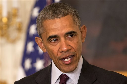 President Barack Obama speaks in the State Dining Room of the White House in Washington, Wednesday, March 30, 2016. President Barack Obama is commuting the prison sentences of 61 people serving time for drug-related offenses. The White House says more than a third of the inmates were serving life sentences. Obama's commutation shortens their sentences. Most will be released July 28. (AP Photo/Jacquelyn Martin)