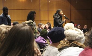In this Friday, Nov. 13, 2015, photo, students take turns speaking during a forum on racial inclusion at the University of Massachusetts Amherst campus, in Amherst, Mass. UMass Senior Vice Provost John McCarthy said students expressed their need to see more faculty of color in the classroom, those who are more familiar with their experiences as students of color. (Dan Glaun/MassLive.com via AP) MANDATORY CREDIT.